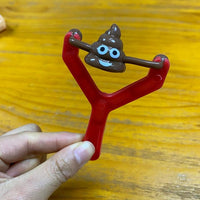 Thumbnail for Poo Plunge Slingshot Toy