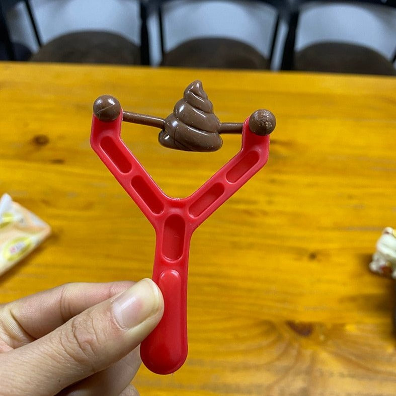 Poo Plunge Slingshot Toy