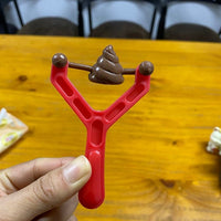 Thumbnail for Poo Plunge Slingshot Toy