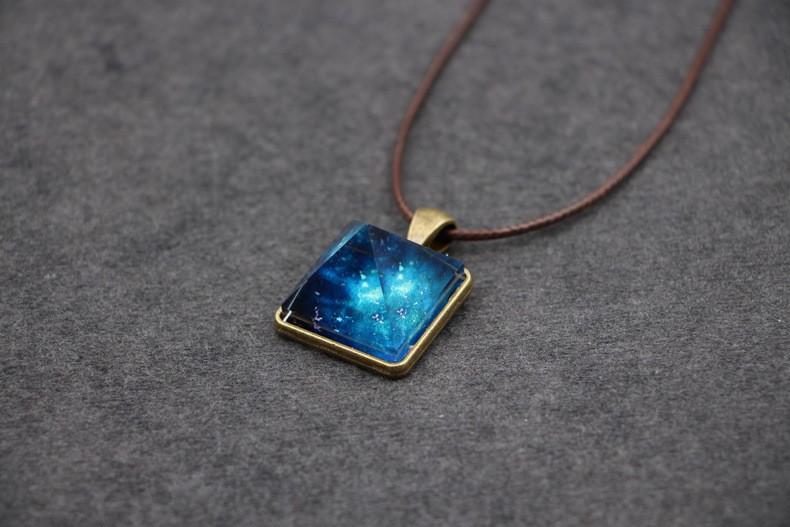 Lyss - Glowing Pyramid Crystal Necklaces