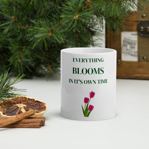 'Everything blooms in it's own time' Mug